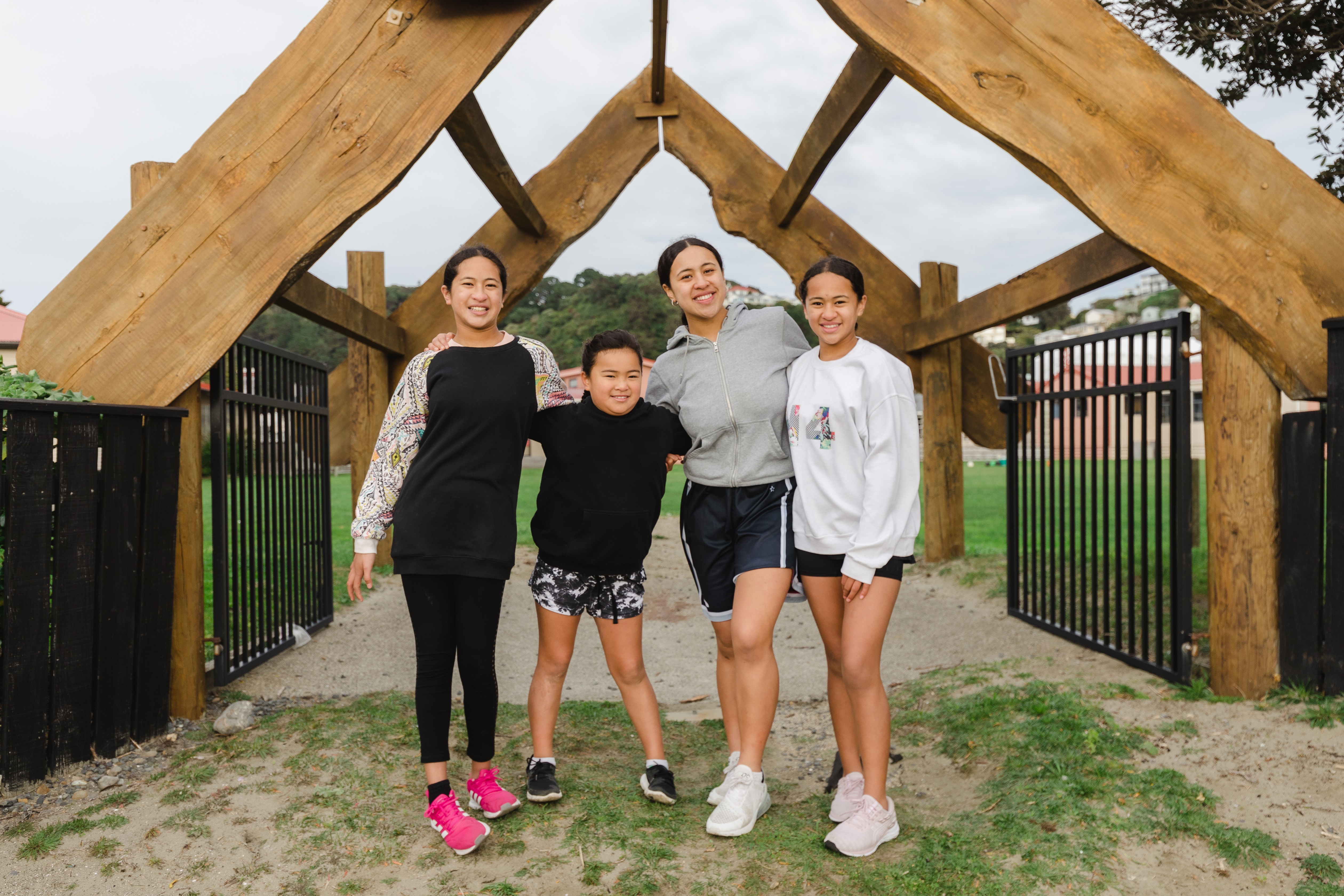 Teenages and child at Marae