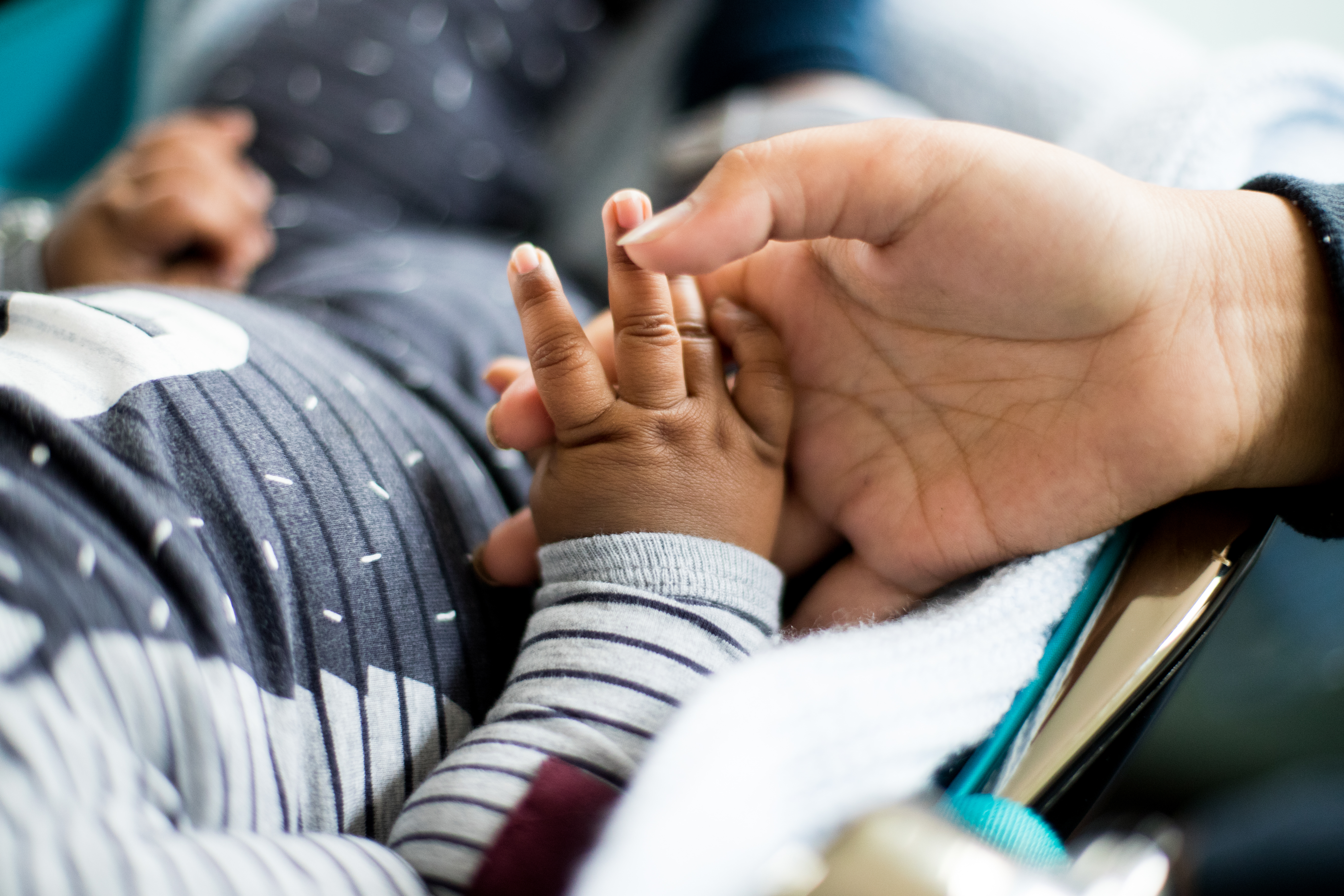 Baby hand in adults 3